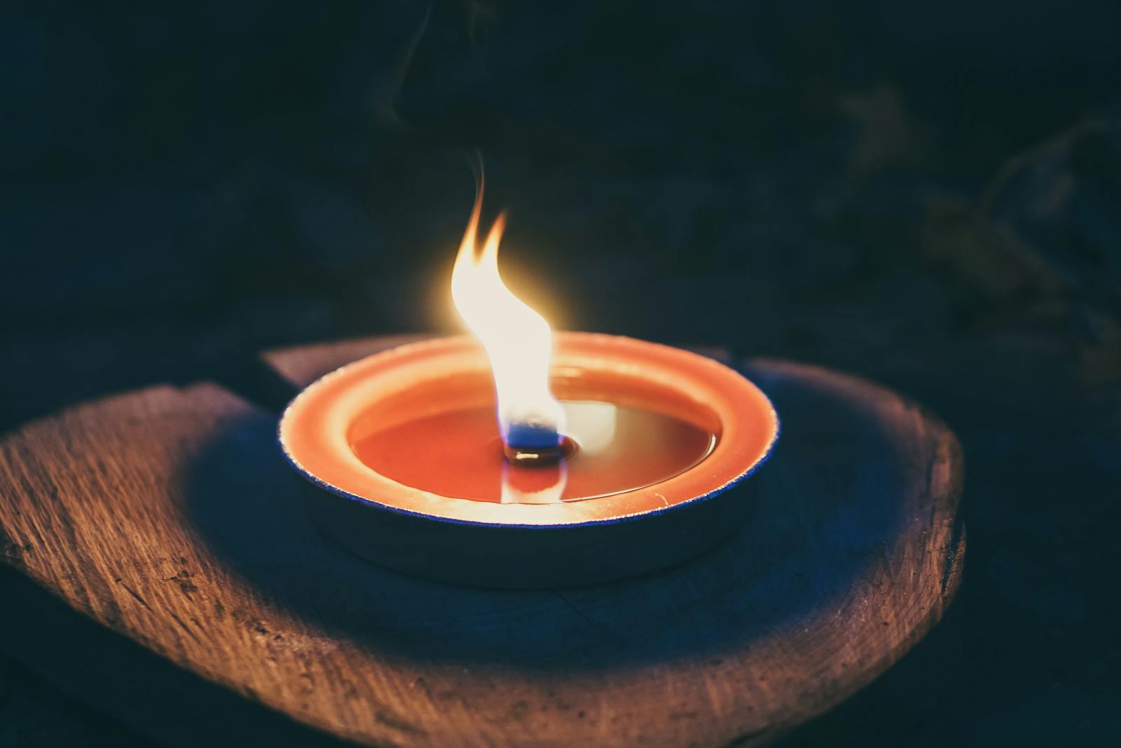 Candle on Wooden Platform