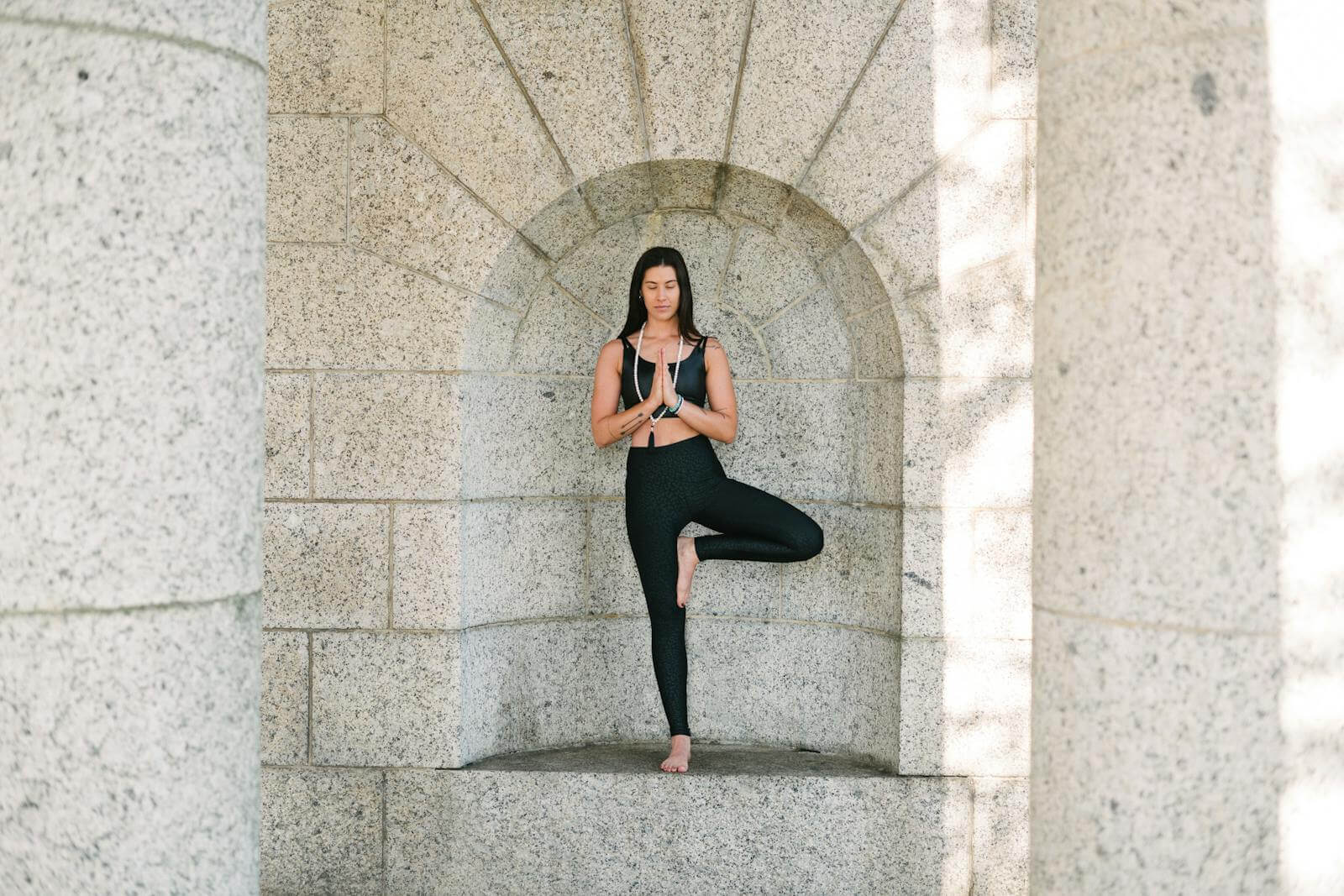 Woman in Black Tank Top and Black Leggings